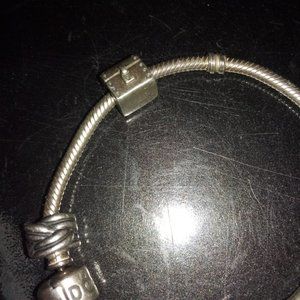 Iconic Retired Pandora bracelet, 7.75 inches long,  sterling silver.